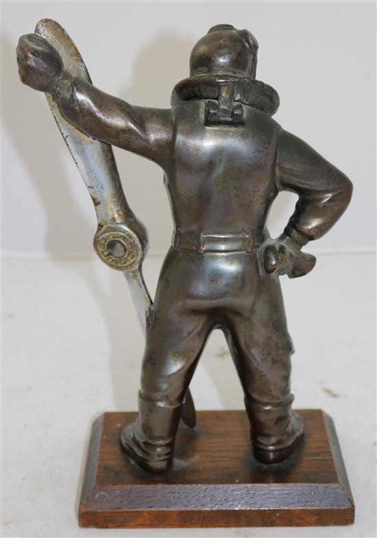 An Art Deco bronzed and chrome plated spelter aviator figural lighter, 10.75in.